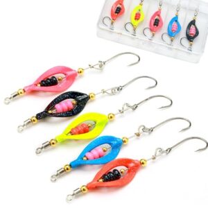 Bild eines Sets von farbigen Twist Spoons für das Forellenangeln mit UV-aktivem und selbstleuchtendem Material, präsentiert in einer transparenten Kunststoffbox.
