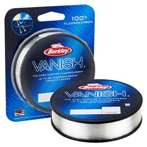 Berkley Vanish Fluorocarbon Angelschnur in transparentem Spulenbehälter, verpackt in blauer Kartonverpackung mit Informationen zu den Vorteilen der Schnur.