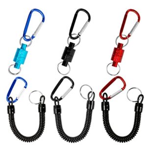 Drei magnetische Netzfreigabe Clips aus Edelstahl in verschiedenen Farben mit Spiralbändern, ideal für das Fliegenfischen und Angelzubehör.
